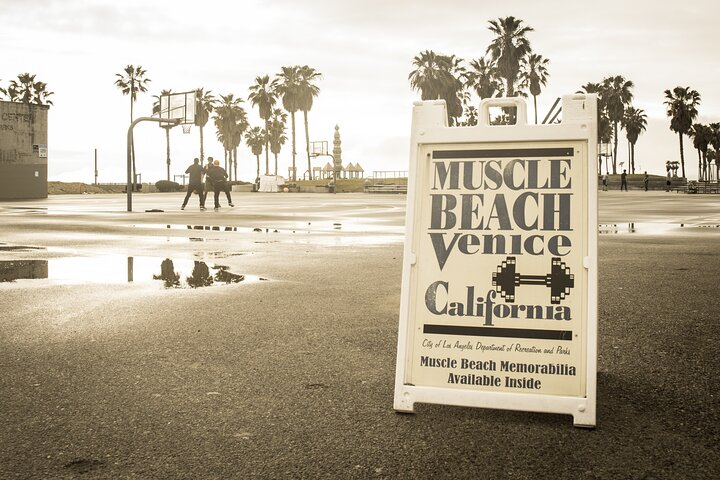 Muscle Beach invites exploration showcasing iconic fitness culture amidst palm trees and ocean views. Perfect for those seeking history artistry and unique spots along the vibrant Venice Boardwalk.